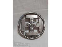 Παλαιό σήμα προσκόπων με σήμα κρίνος