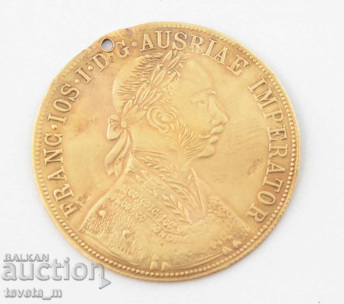 Revival-era brass pendant for jewelry, 1905