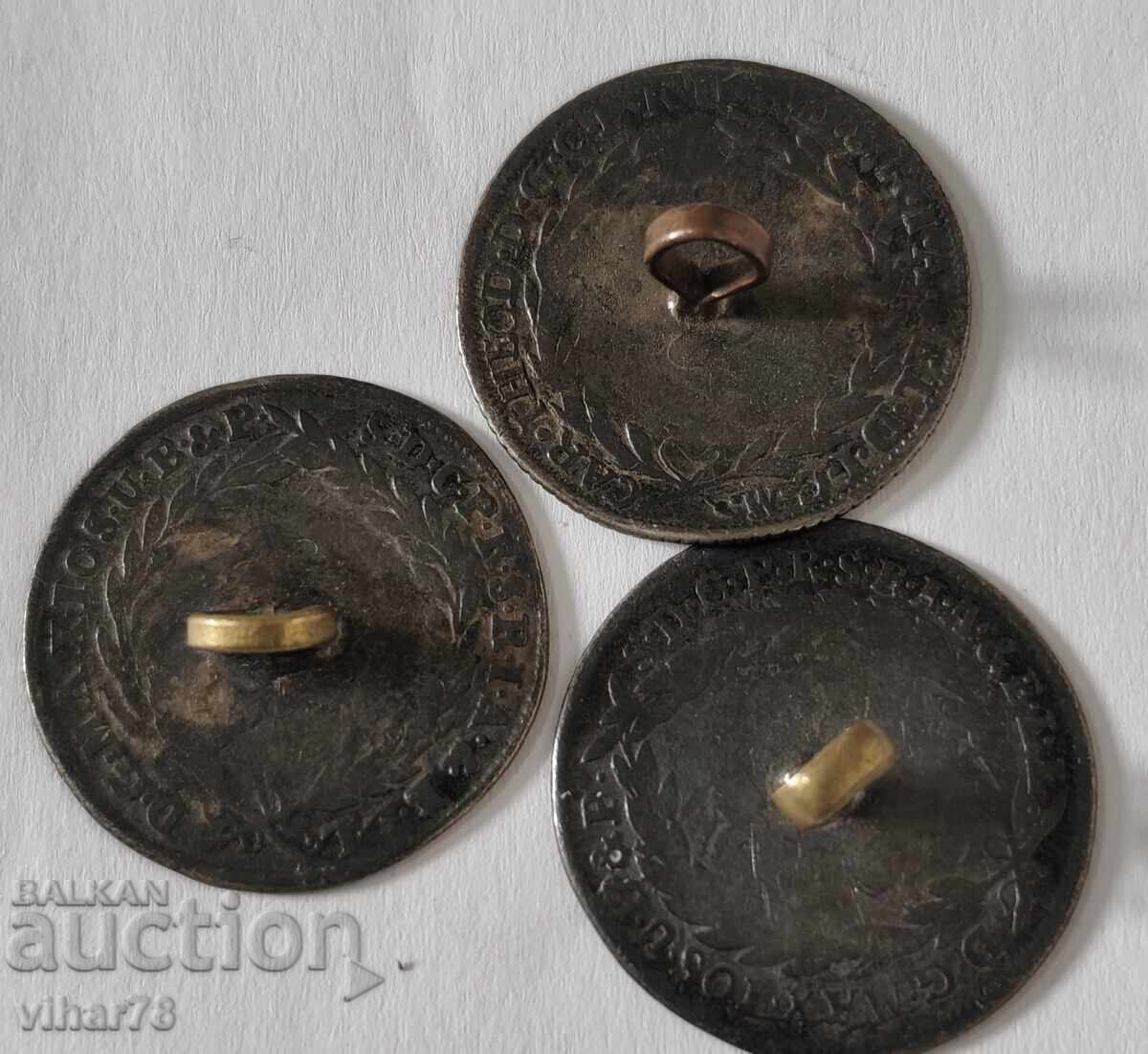 Delivery of LOT OF THREE SILVER BUTTONS