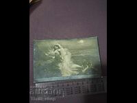 Ταχυδρομική κάρτα - Γυμνή γυναίκα σε βράχους στη θάλασσα