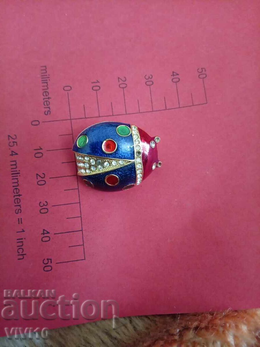 Broșă veche email cu preț € 10.00 | 19.56 BGN