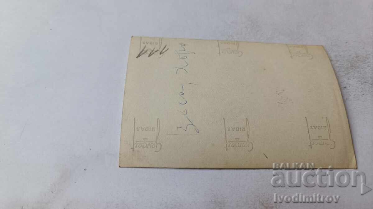 Photo of a Young Man and a Young Woman on the Beach with price 1.85 BGN | € 0.95