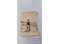 Photo Varna Young girl on the pier