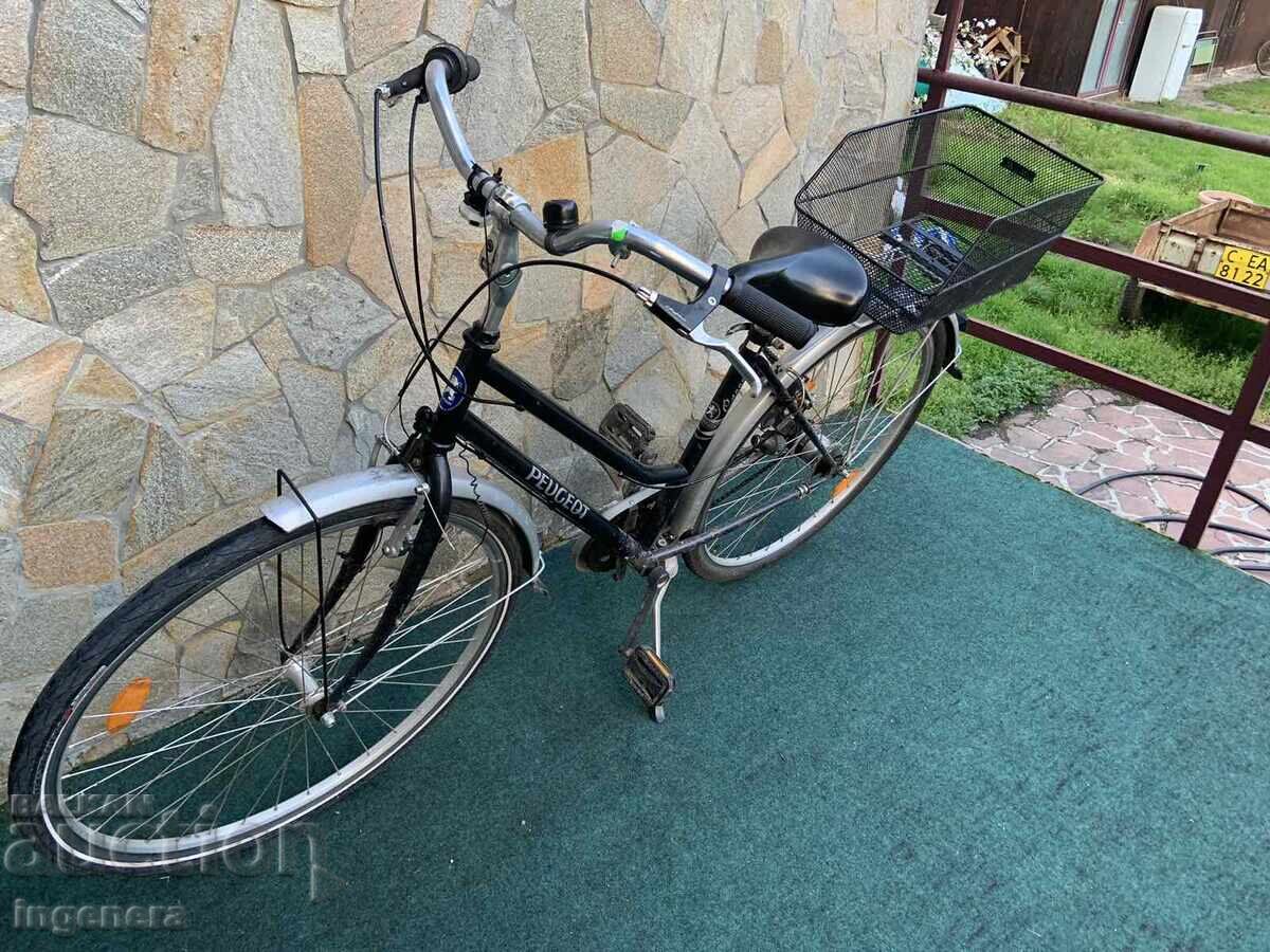 Auction  Bicycle Wheel, Well-Preserved PEUGEOT