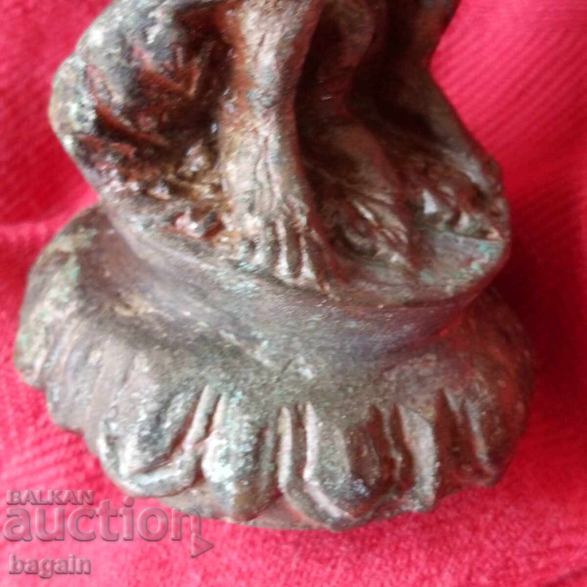 Delivery of Old bronze statue