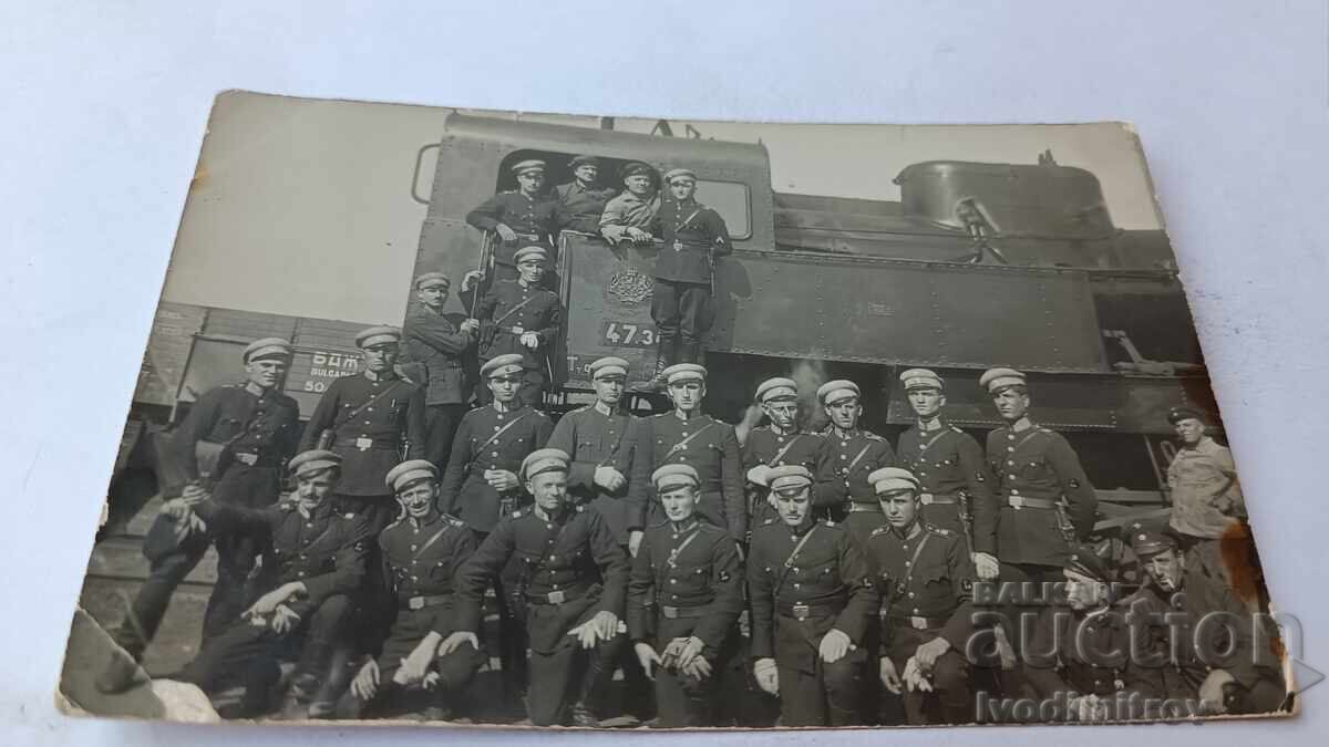 Photograph of Officers and Soldiers in front of a Steam Locomotive