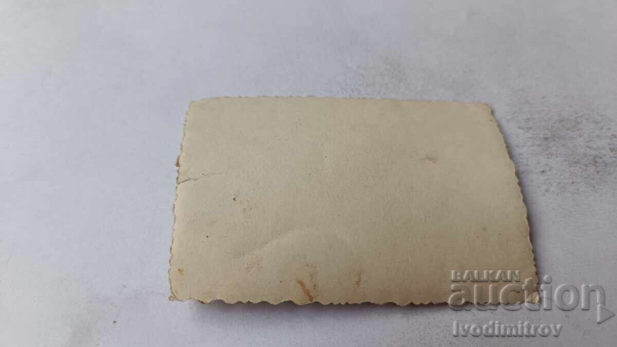 Photo of three young men sitting on the stairs of a pier with price 2.65 BGN | € 1.35