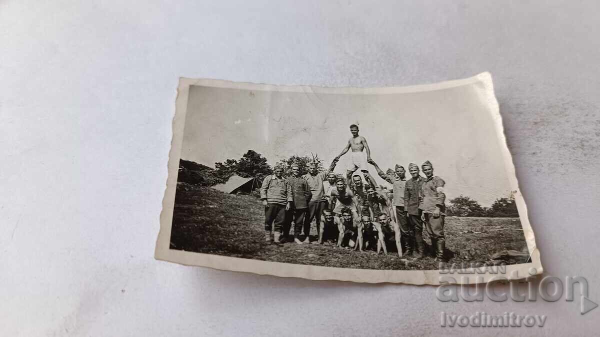 Photograph of Officers and Soldiers on a Meadow in Front of a Tent Camp