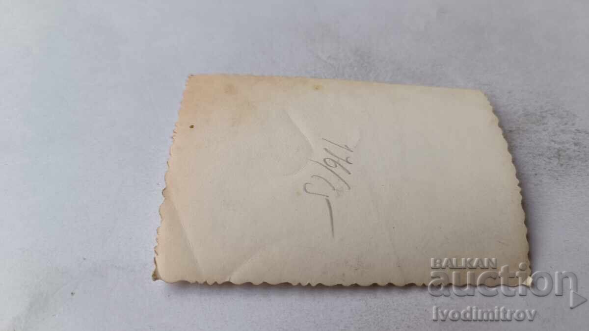 Photo: Young man and three boys on the seashore with price 2.65 BGN | € 1.35