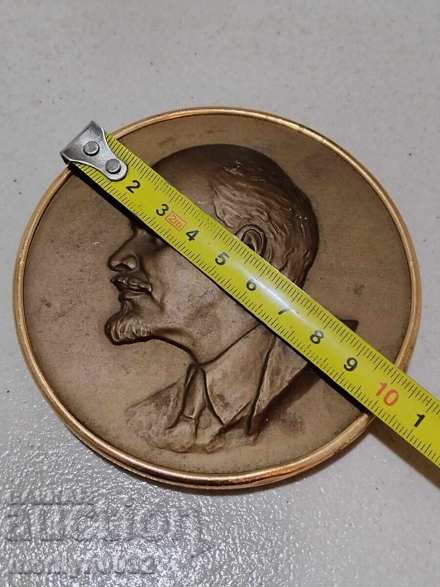 Auction  Metal relief image of the leader Lenin, plaque figure