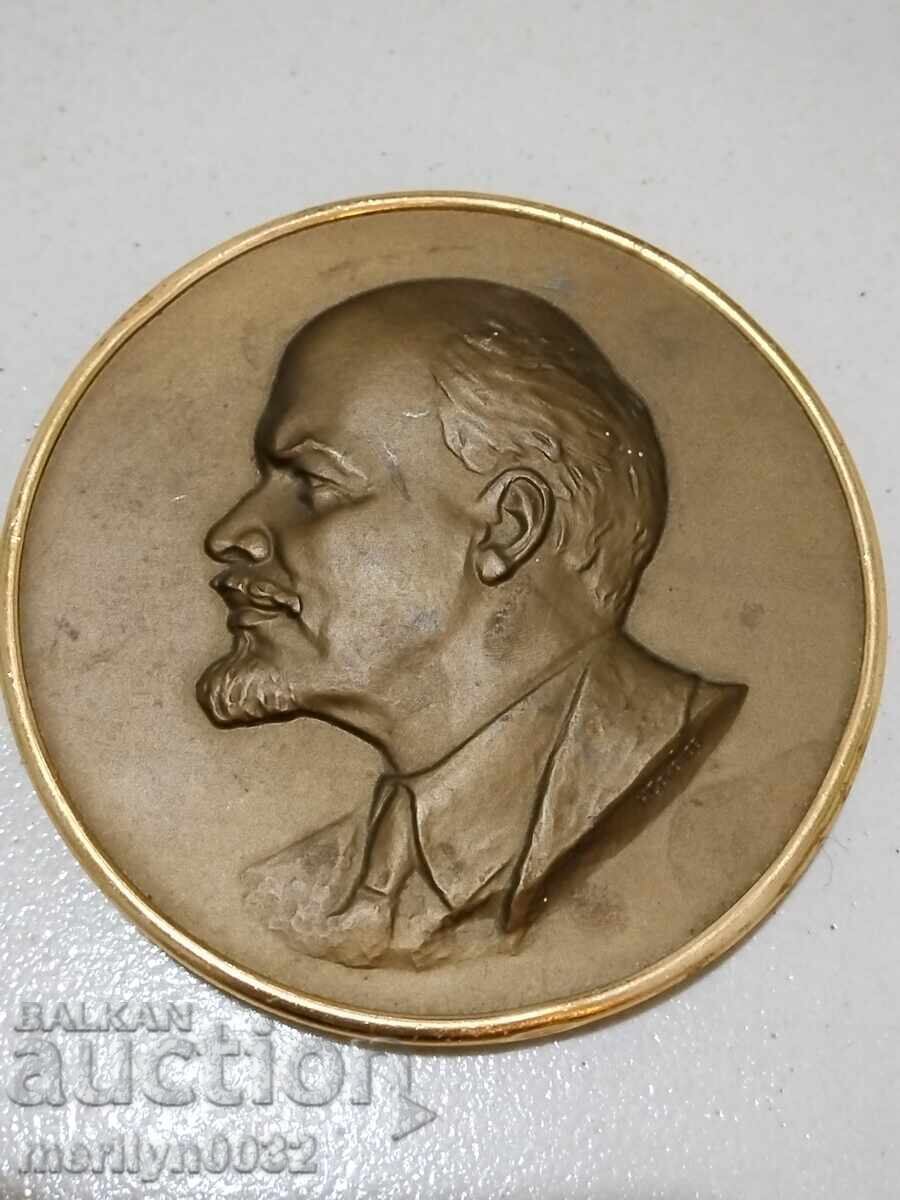 Metal relief image of the leader Lenin, plaque figure