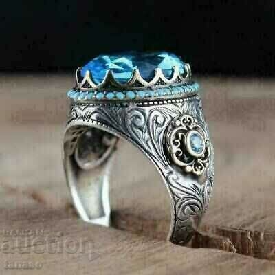 Delivery of Men's ring with aquamarine and zircons