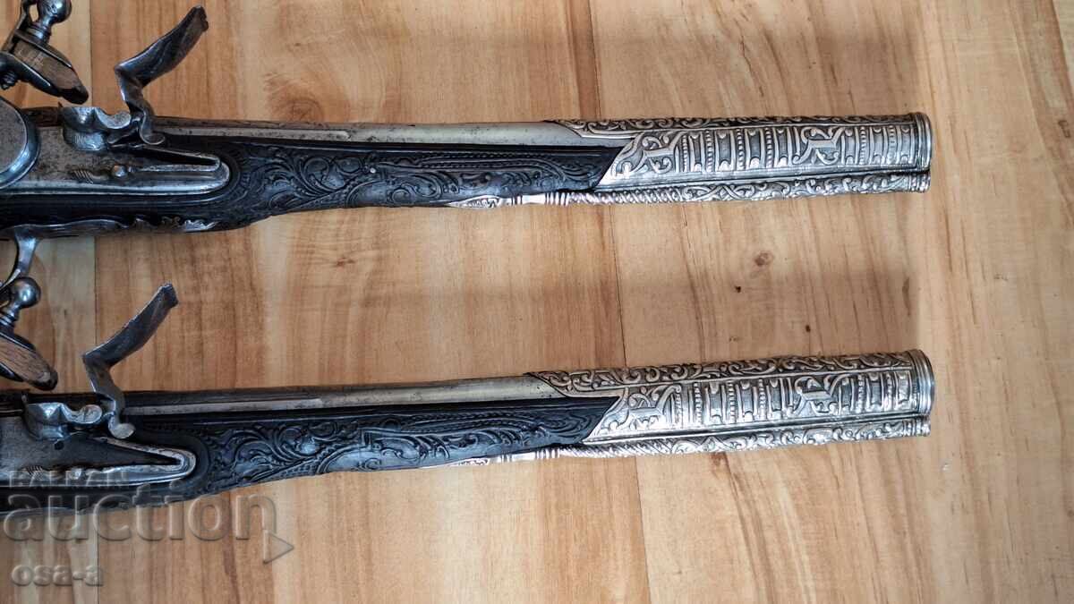 Auction  A pair of shotgun revolver pistols