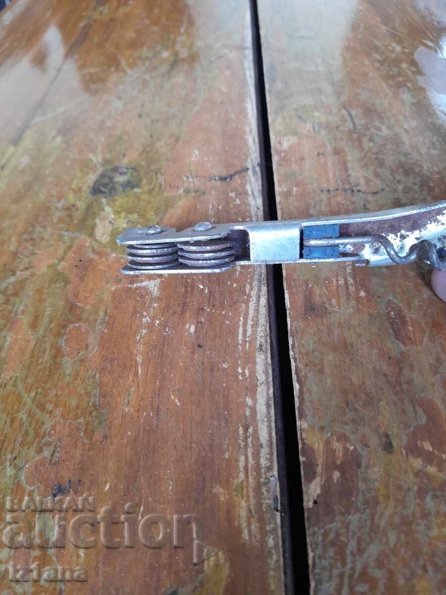 Auction  Old can opener, sharpener