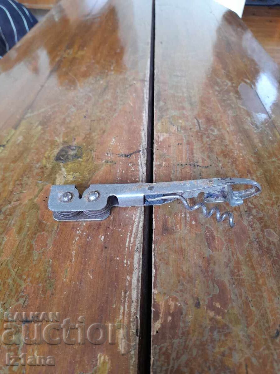 Old can opener, sharpener