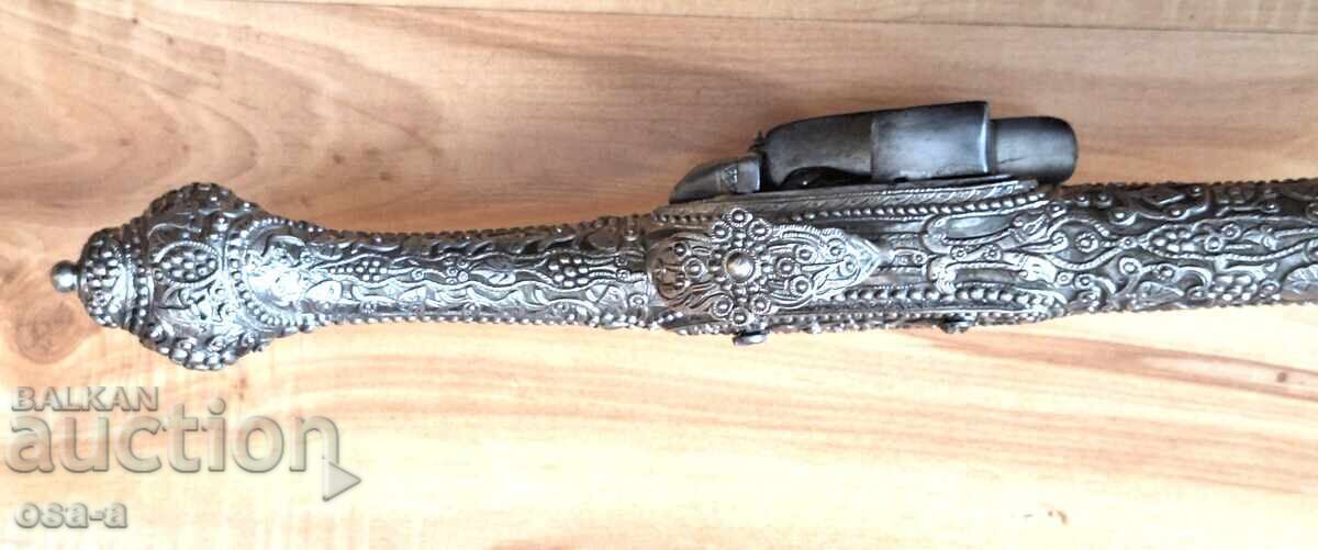 Delivery of A pistol, a rifle, a revolver