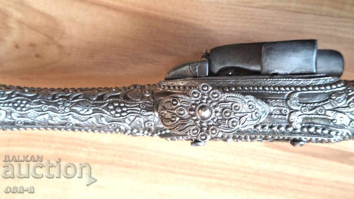 A pistol, a rifle, a revolver - 6