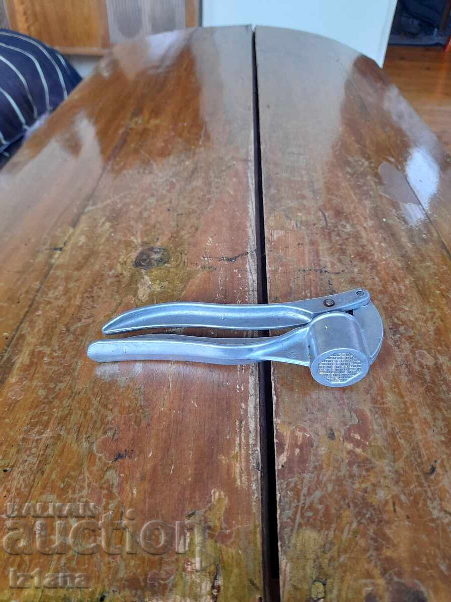 Old aluminum garlic press