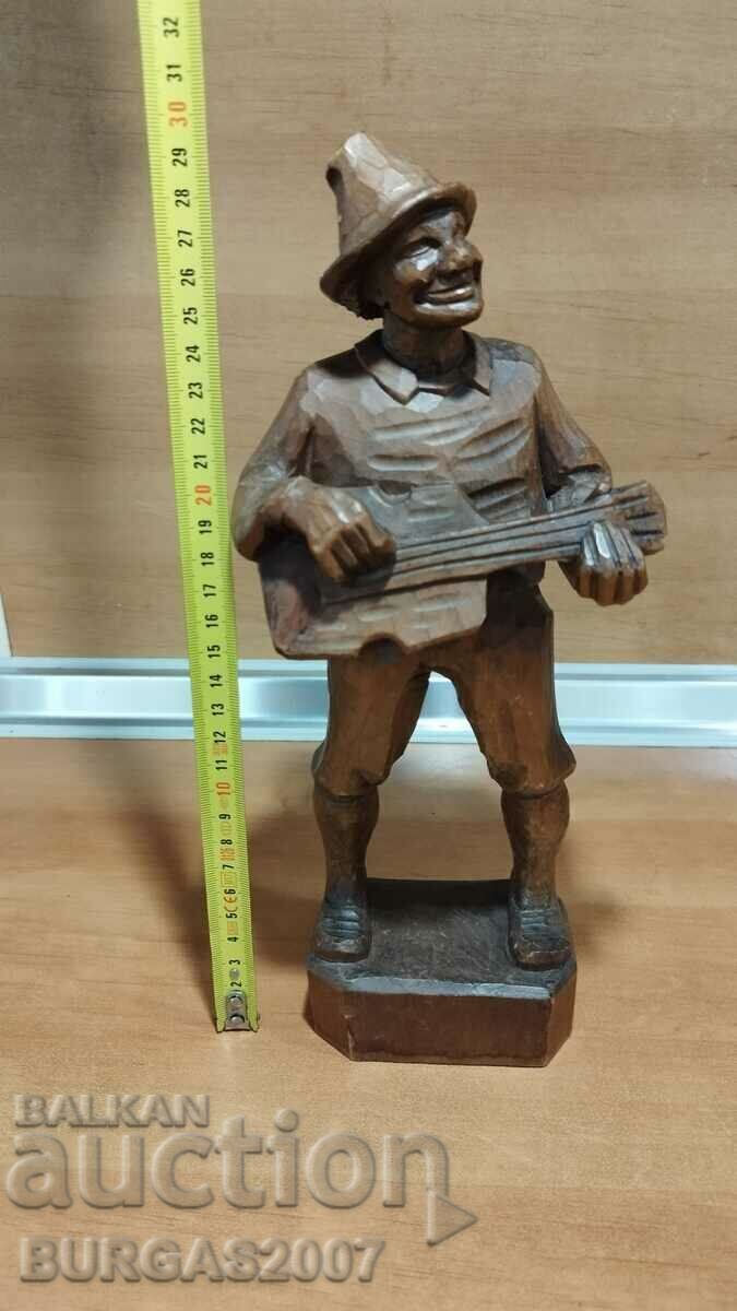 Old wooden figure, musician with guitar, 30 cm. with price 110.00 BGN | € 56.24 Old wooden figure, musician with guitar, 30 cm. with price 110.00 BGN | € 56.24