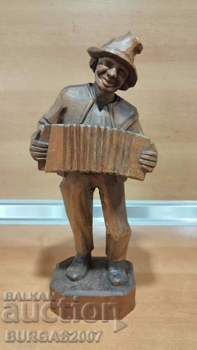 Old wooden figure, musician with accordion, 29 cm. Old wooden figure, musician with accordion, 29 cm.