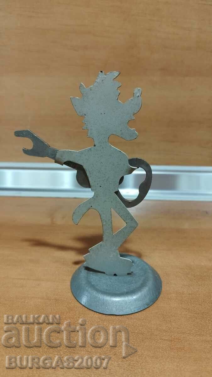 Auction Old metal figure with a guitar opener, from "Well, guess!" Auction Old metal figure with a guitar opener, from "Well, guess!"