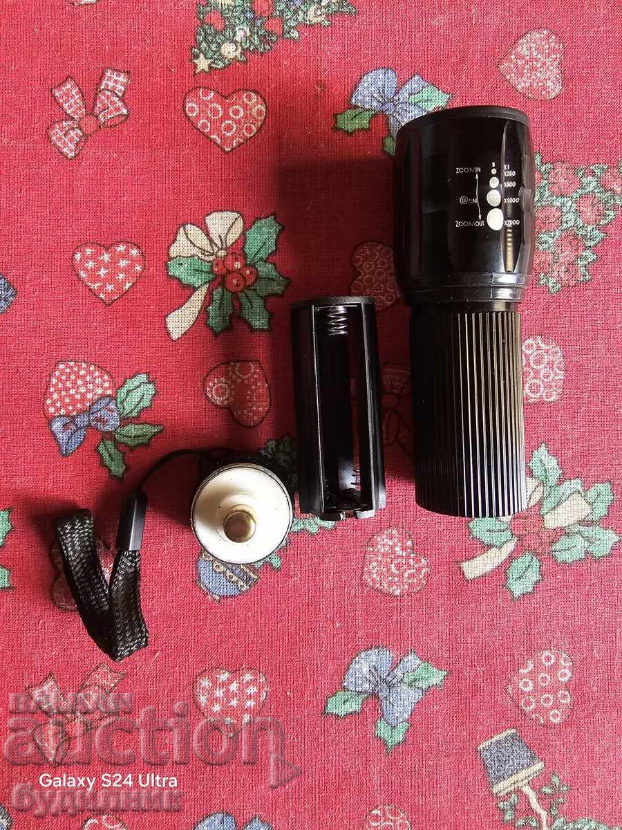 Brand new flashlight BZC. I'm listing over 100 auctions. Take a look