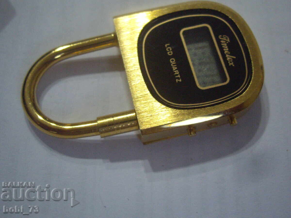 Livrarea Ceas electronic vechi, placat cu aur