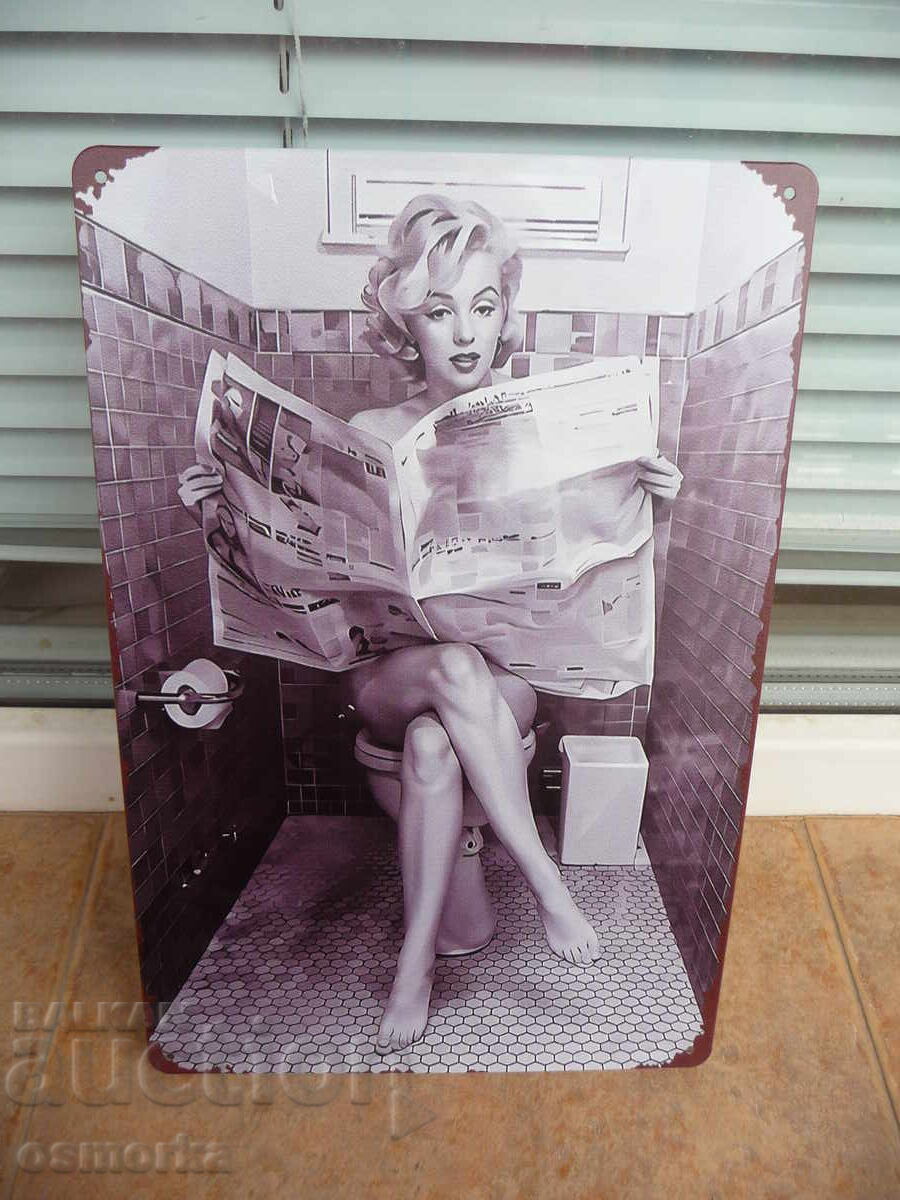 Metal sign, movie Marilyn Monroe reading newspaper, toilet humor Metal sign, movie Marilyn Monroe reading newspaper, toilet humor