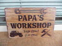 Plăcuță metalică inscripționată Atelierul tatălui repară jucării