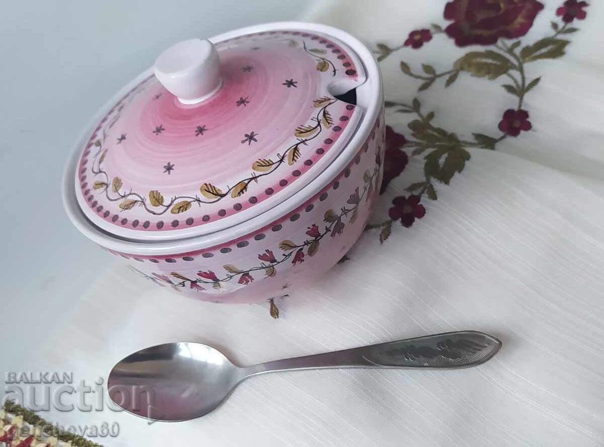 Glazed ceramic sugar bowl in pink and spoon