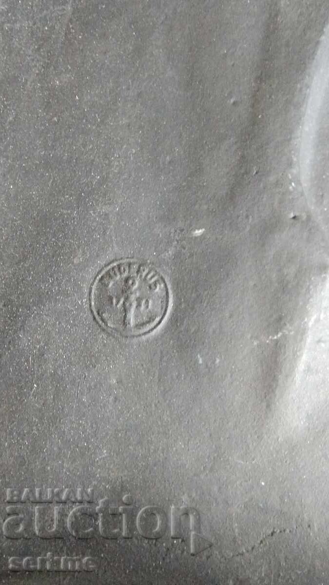 Licitație Figura de metal