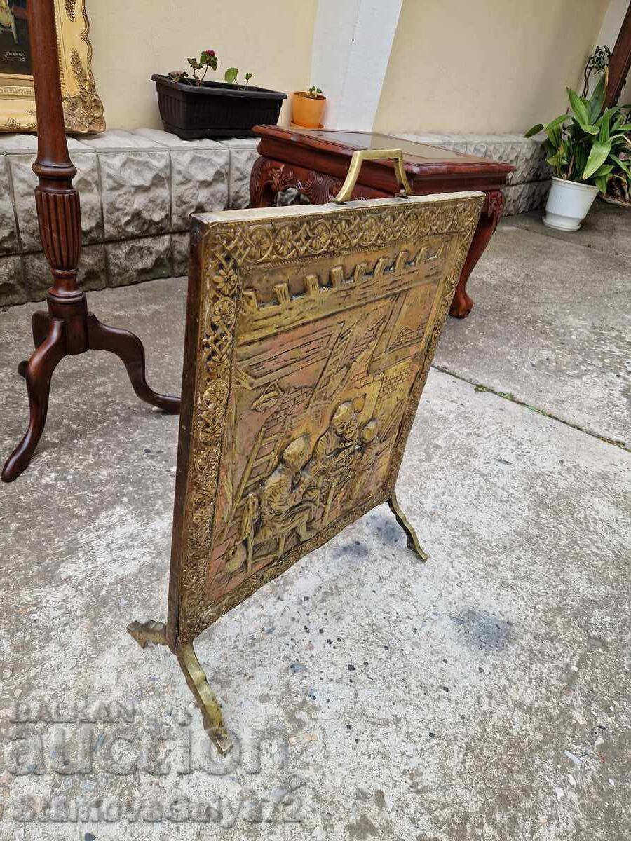 Delivery of Unique antique English bronze fireplace grate panel