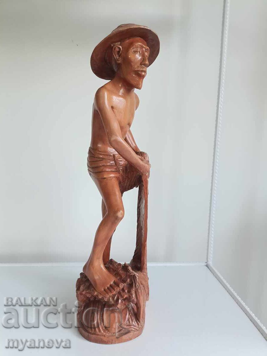 Wood carving of a fisherman from Indonesia - 5