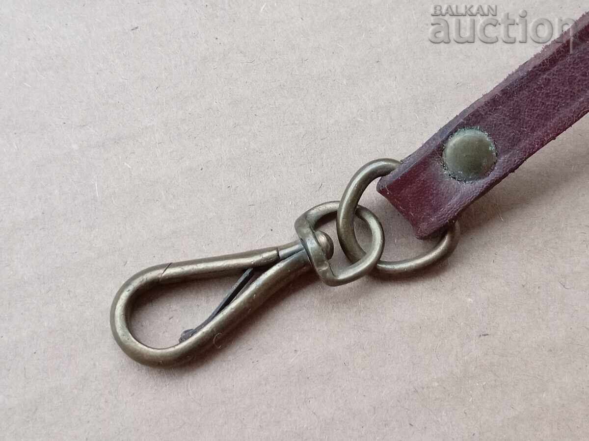 Δημοπρασία Δερμάτινο λουράκι με μπρούτζινη καραμπίνα για πιστόλι ρεβόλβερ WW1