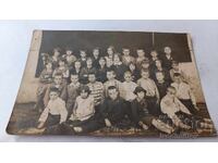 Photo of Students with their Teacher