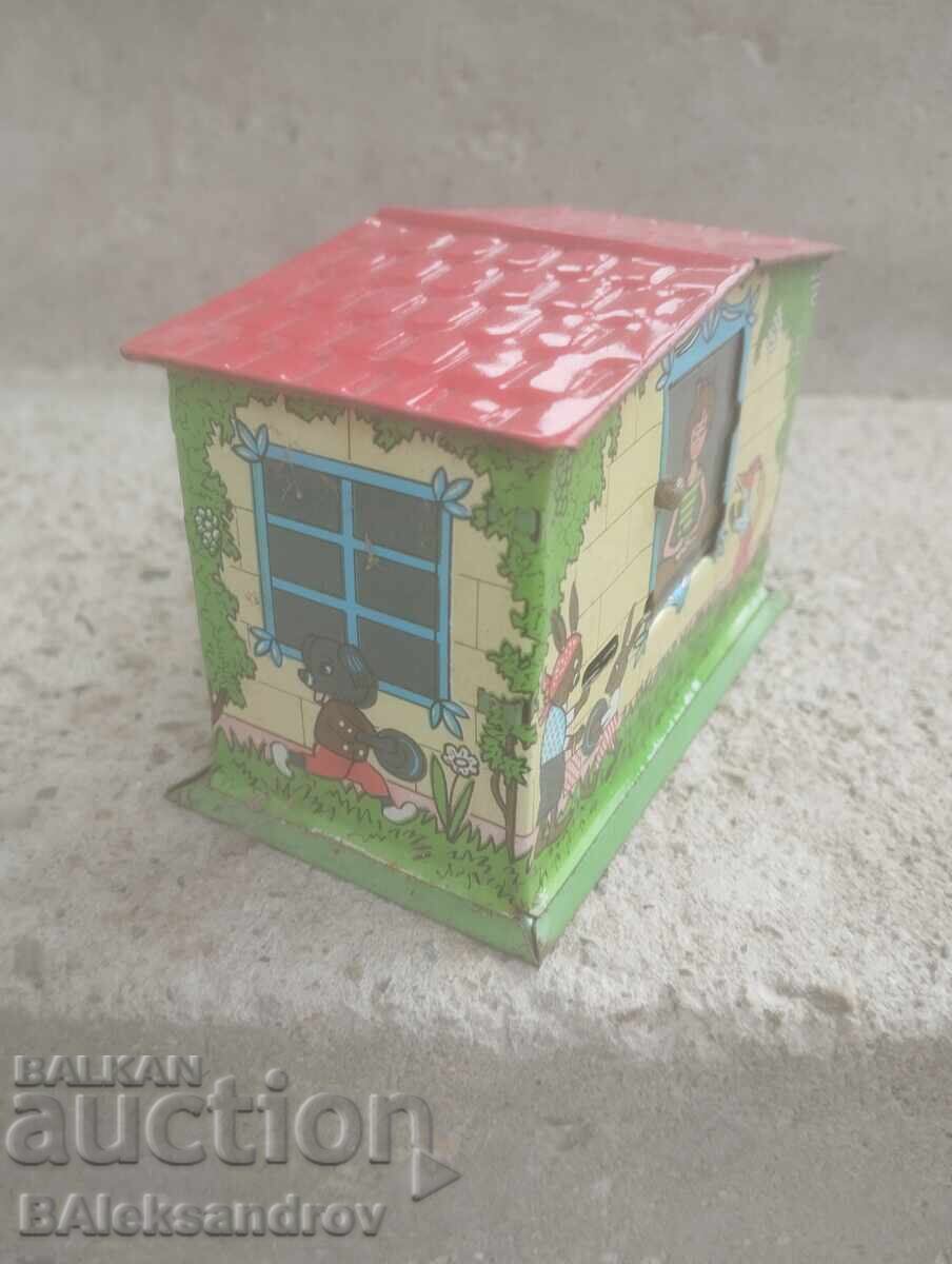 Delivery of Old tin piggy bank