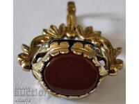 Vechi pandantiv spinner din aur de 9 carate cu onix, carneol și granat