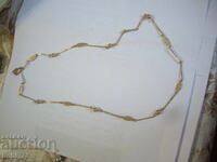 Позлатено ланче.