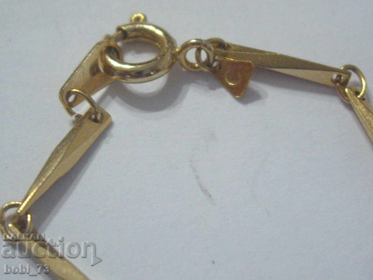 Доставка на Позлатено ланче.