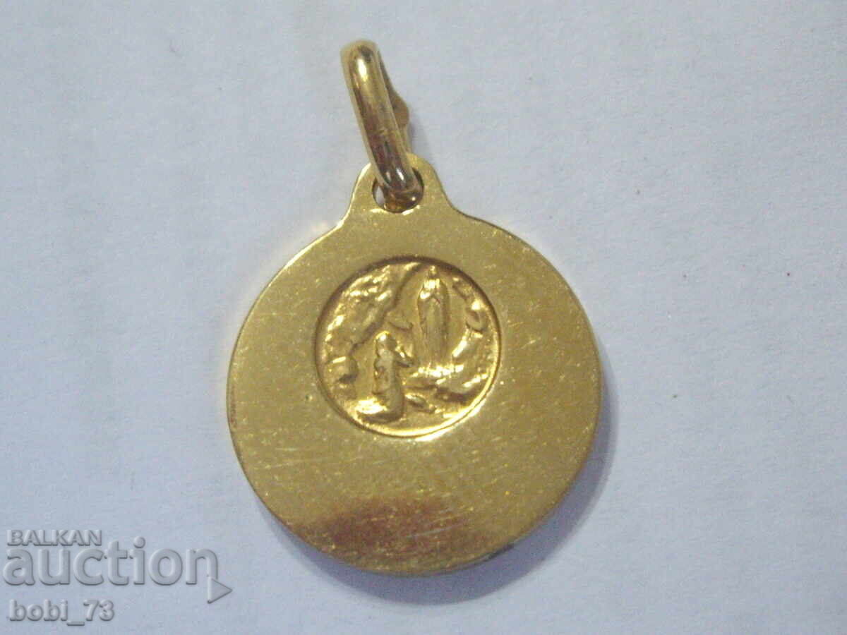 Auction Gold-plated pendant for a necklace, some marking present Auction Gold-plated pendant for a necklace, some marking present