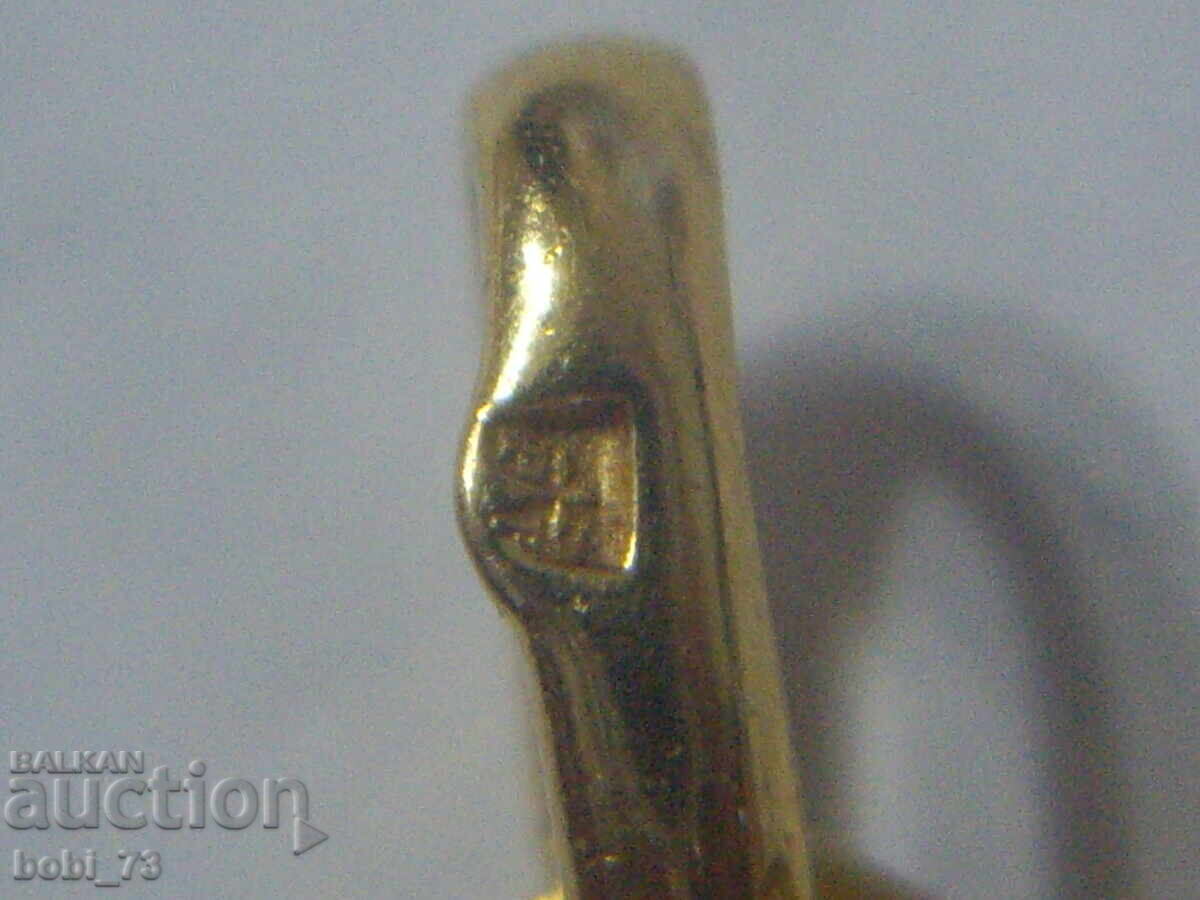 Delivery of Gold-plated pendant for a necklace, some marking present Delivery of Gold-plated pendant for a necklace, some marking present