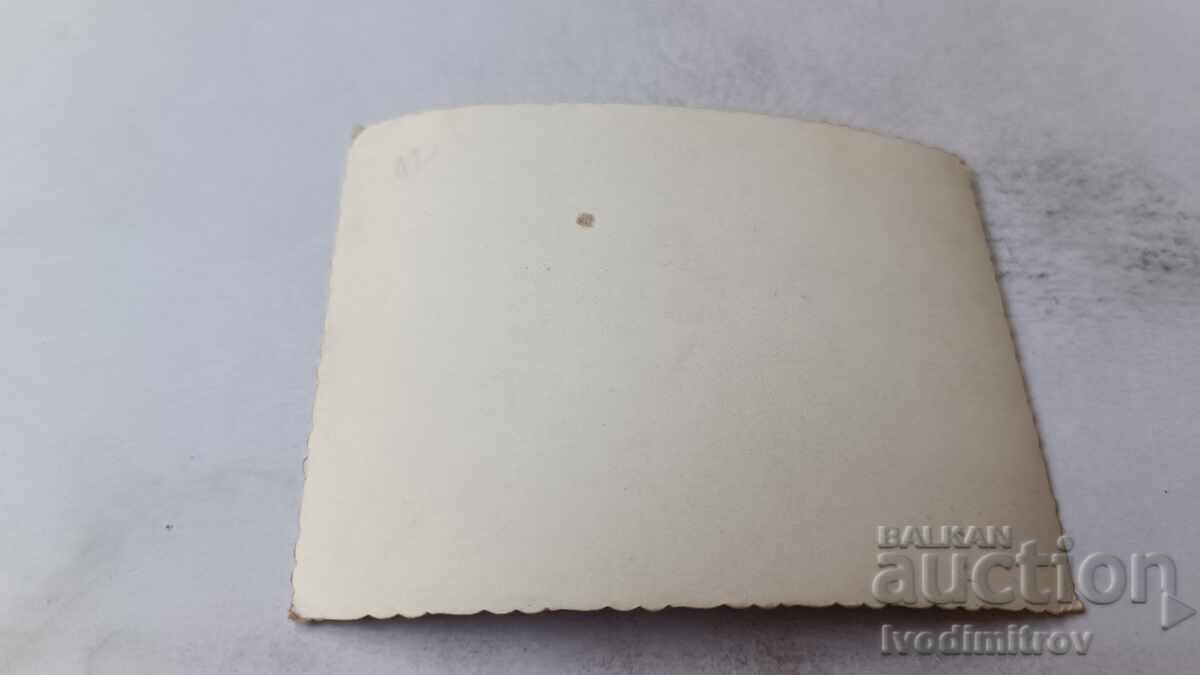 Photo Sofia Young men and women in front of a Department Store with price 2.15 BGN | € 1.10