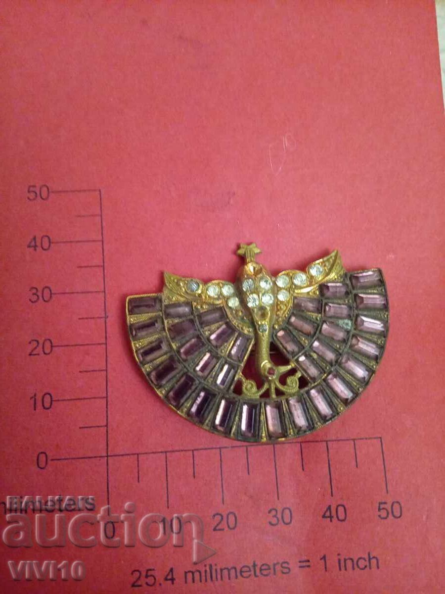 Antique brooch with stones