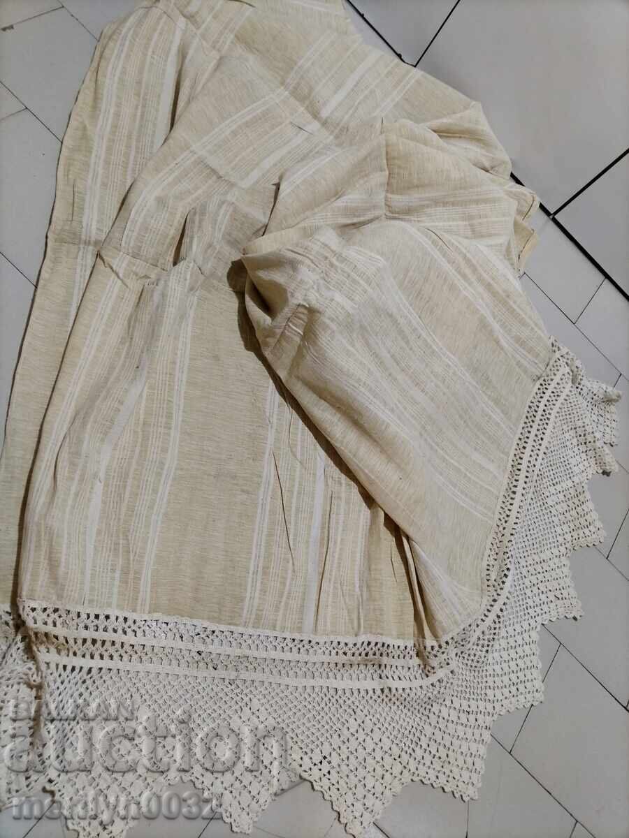 Old hand-woven sheet with lace trim