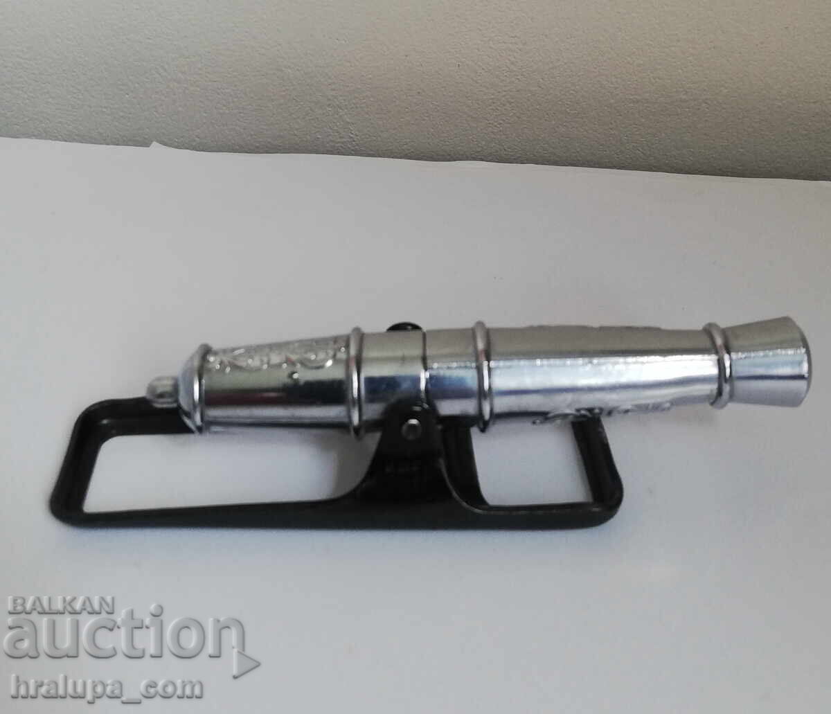 Auction  Corkscrew bottle opener cannon