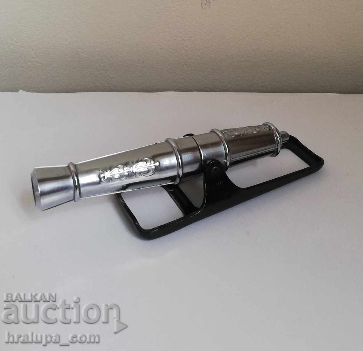 Corkscrew bottle opener cannon