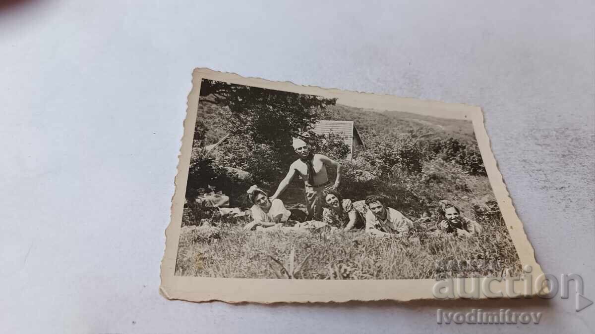Photograph of Young Men and Women Lying on the Grass in the Mountains 1942