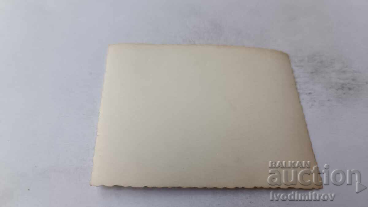 Photo Sofia Man in front of a Moskvich car in winter with price 1.75 BGN | € 0.89