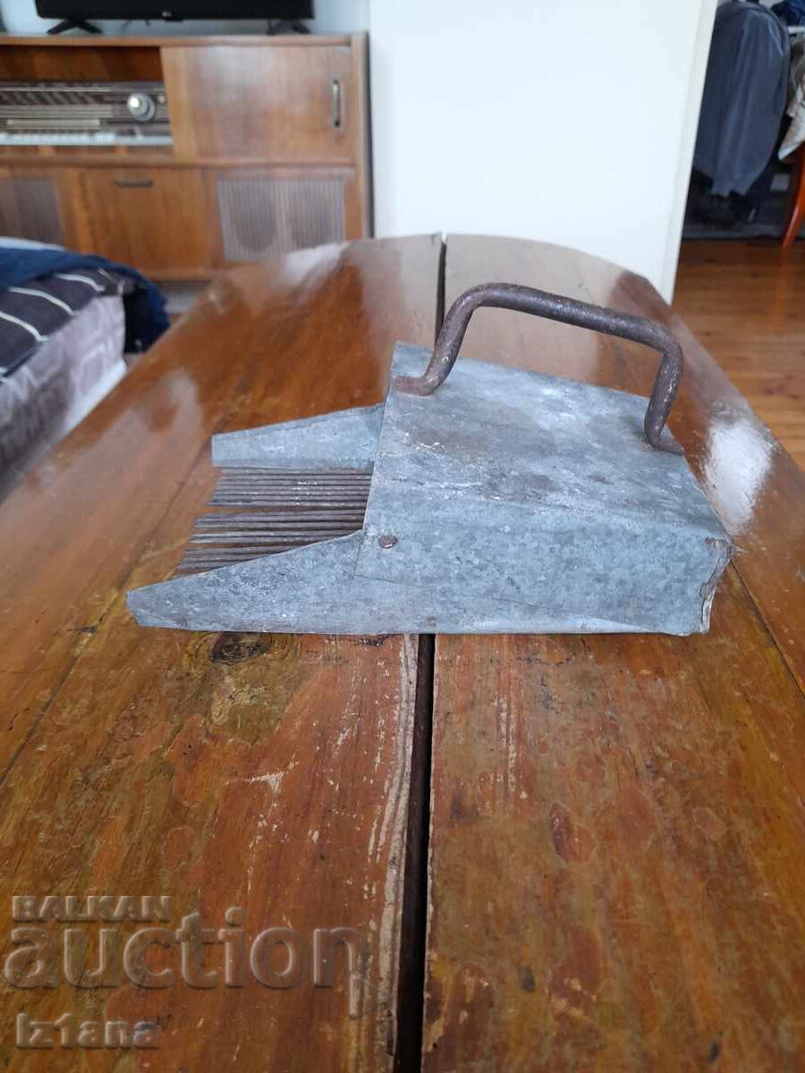 Antique blueberry picker