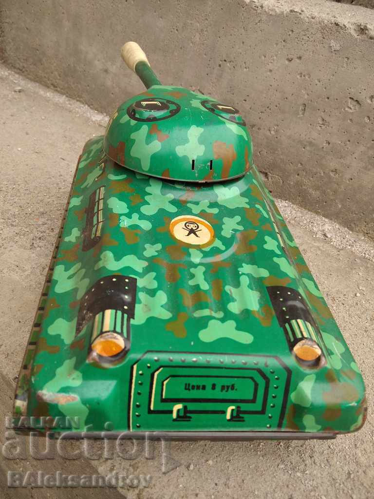 Delivery of Old tin electric toy